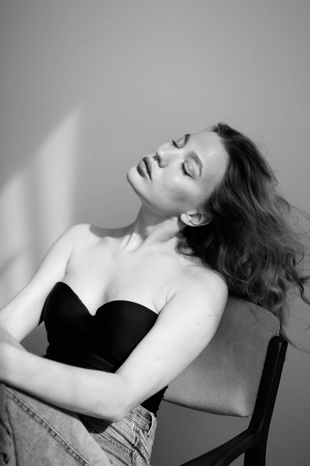 A person in deep relaxation during a guided hypnotherapy session
