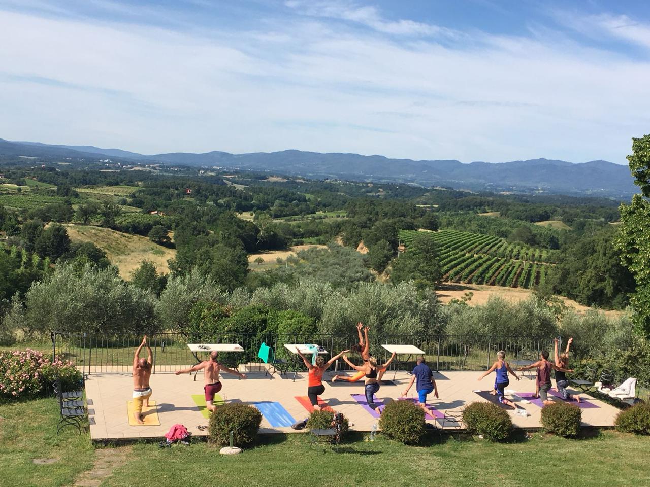 Leading a yoga retreat with panoramic mountain views